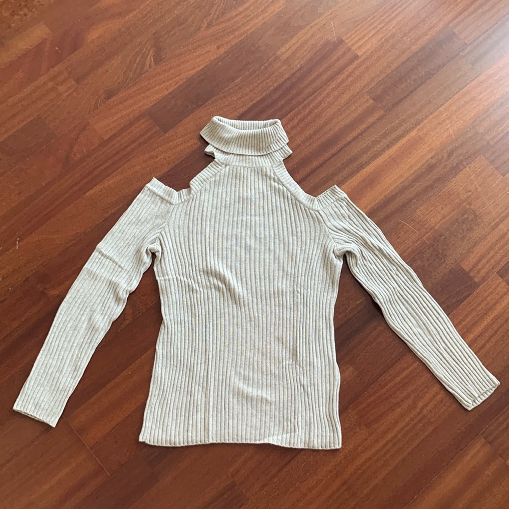 Network turtleneck sweater with cut-out shoulders